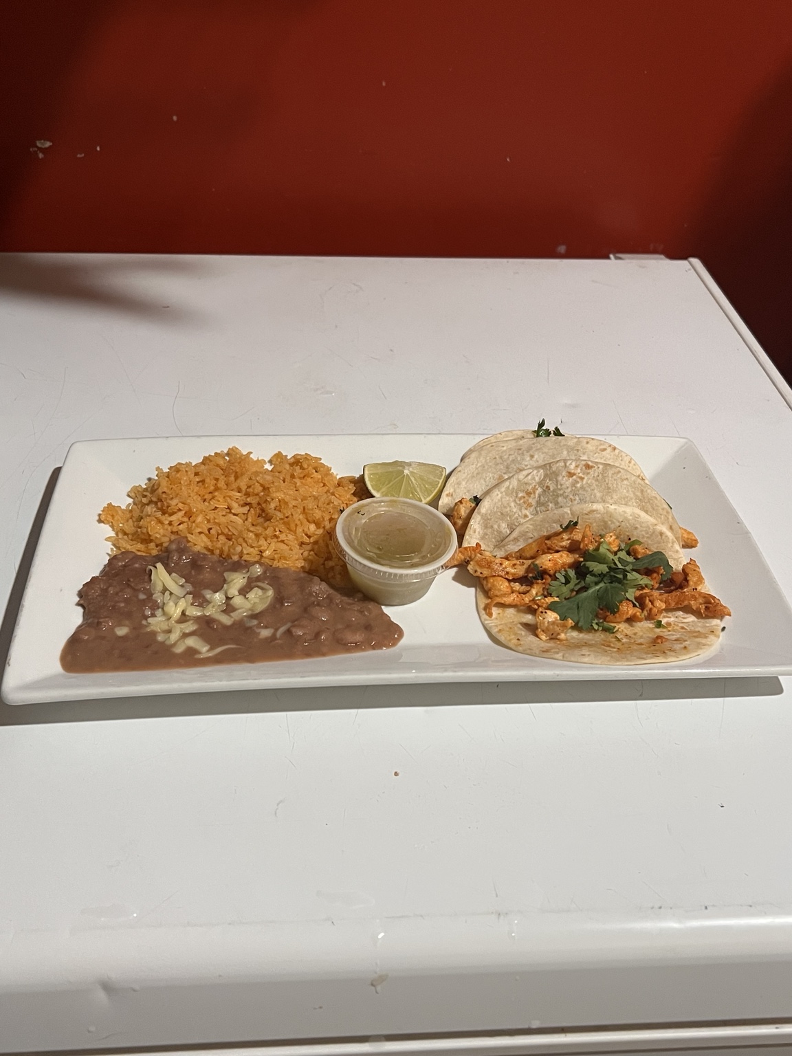 Taco meal with rice and beans